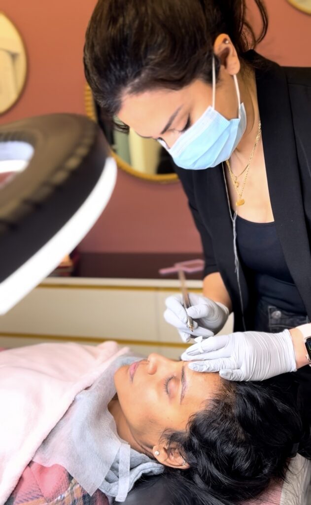 Screenshot Microblading artist at Seven Sky Beauty creating natural eyebrows hair strokes